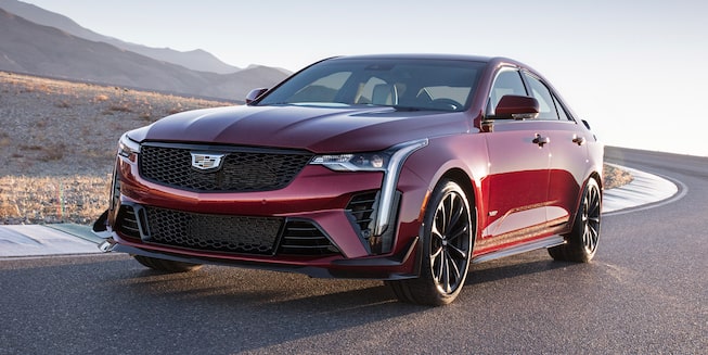 2022 CT4-V Blackwing driving on the road.