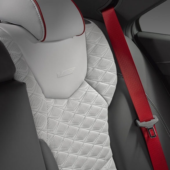 Torch Red seat belts on the seats of the 2026 Cadillac CT4-V luxury sports sedan.