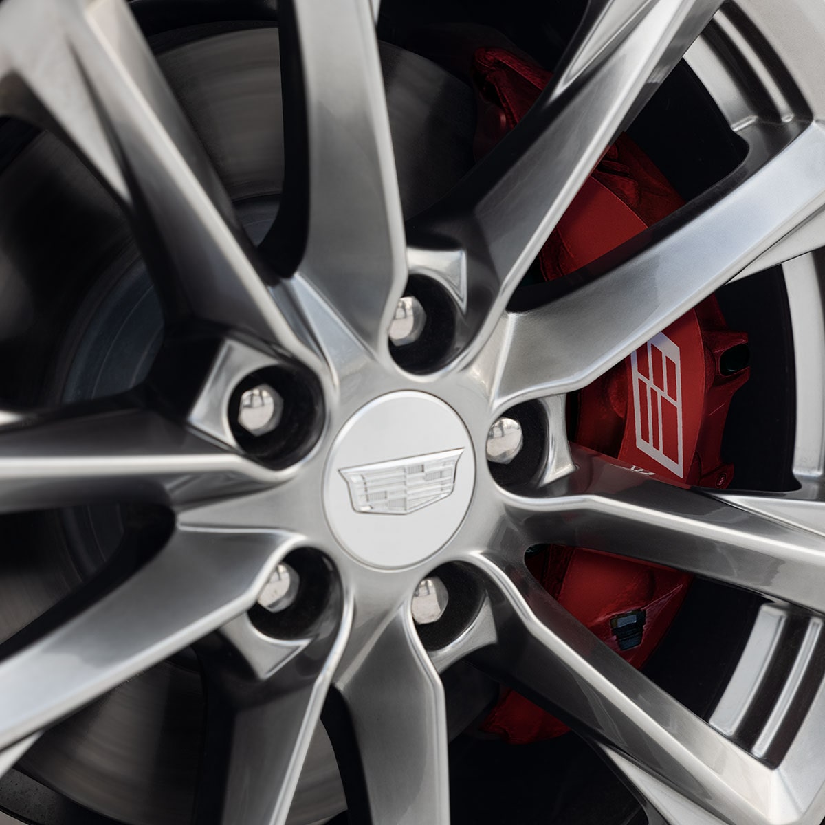 Close up view of the premium alloy wheels on the 2026 Cadillac CT4 luxury sedan.