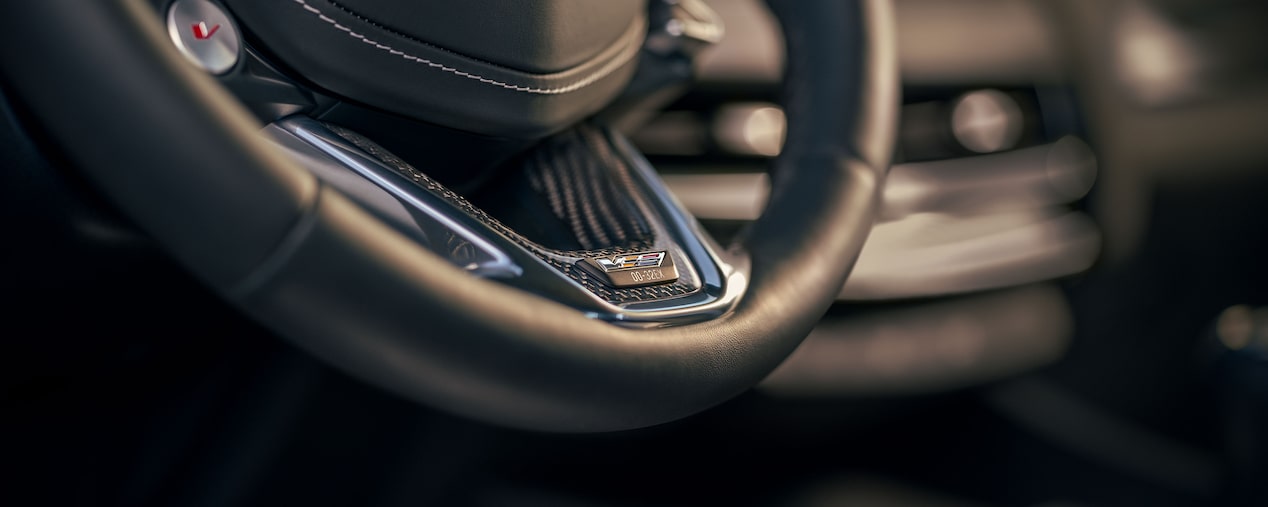 Close-up view of the steering wheel of the Cadillac CT5-V Blackwing.
