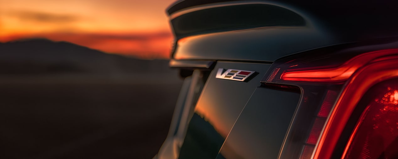 Close-up view of the V-series badging on the tailgate of a Cadillac V-series vehicle.