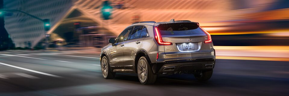 Scenic view of 2024 Cadillac XT4 overlooking a city.