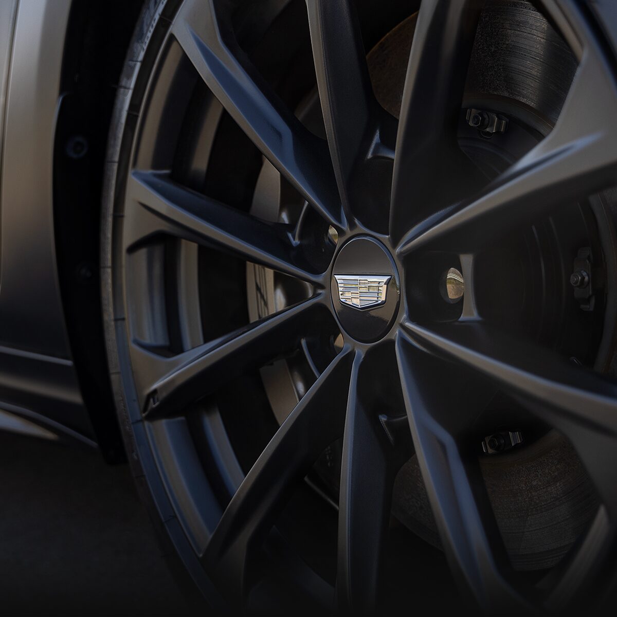 The Iconic Cadillac Badging on a Black on Black Tire & Rim