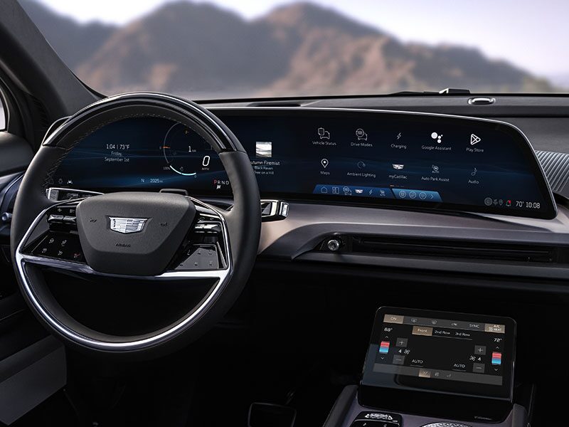 Passenger View of a Driver Selecting Climate Controls on the ESCALADE IQ Large Control Center Display