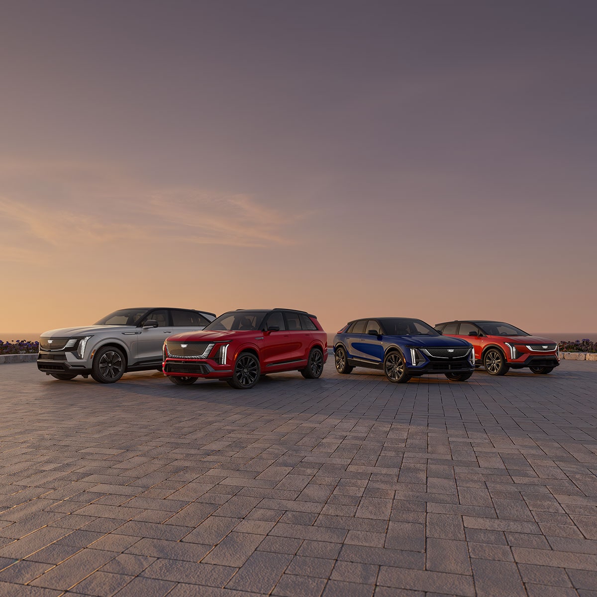 The Cadillac Electric Vehicle Line-up Parked Under a Beautiful Sunset