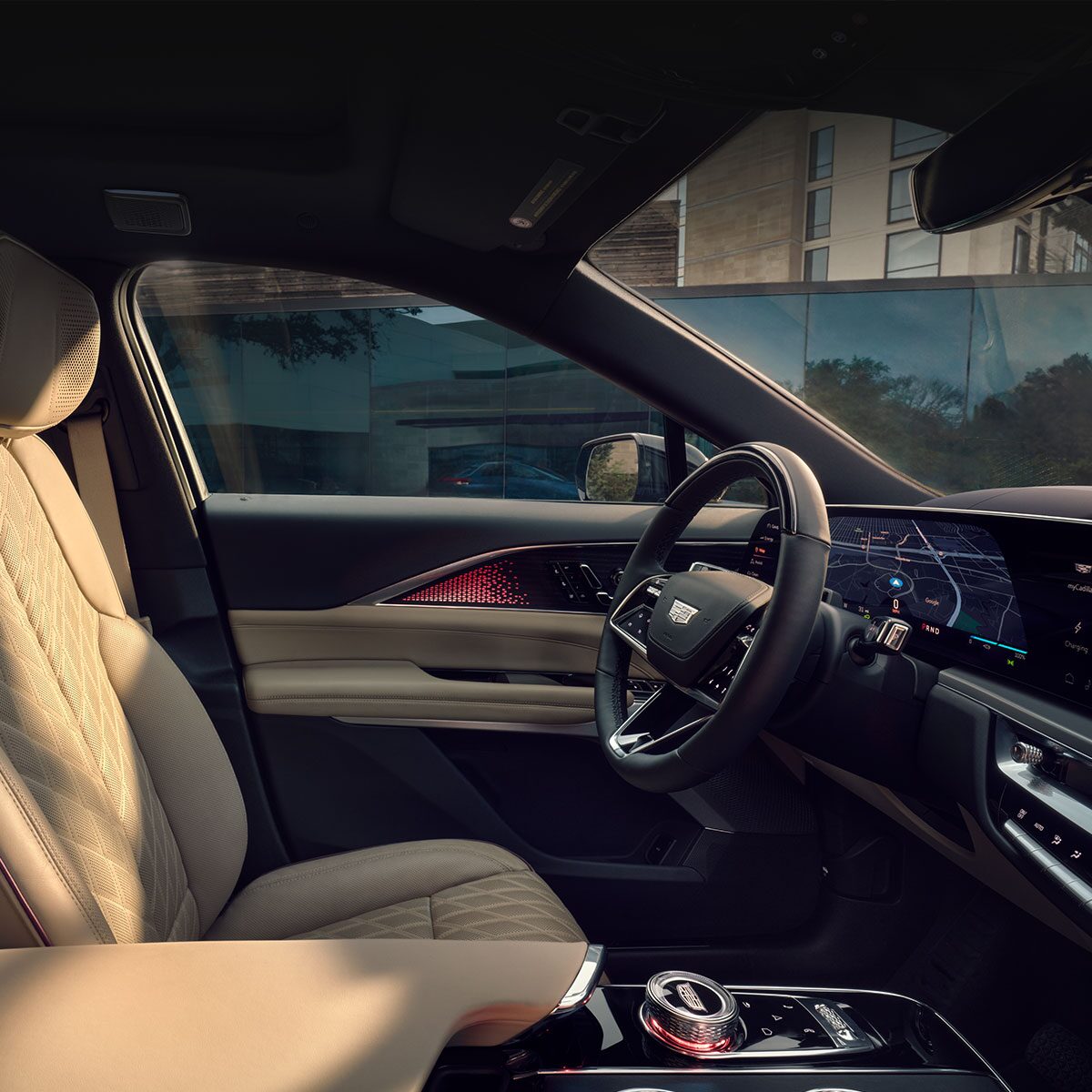 The interior driver-side of a Cadillac LYRIQ