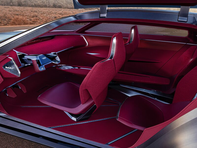 Driver Side View of the Cadillac Elevated Velocity Concept Vehicle's Red Interior and Cabin