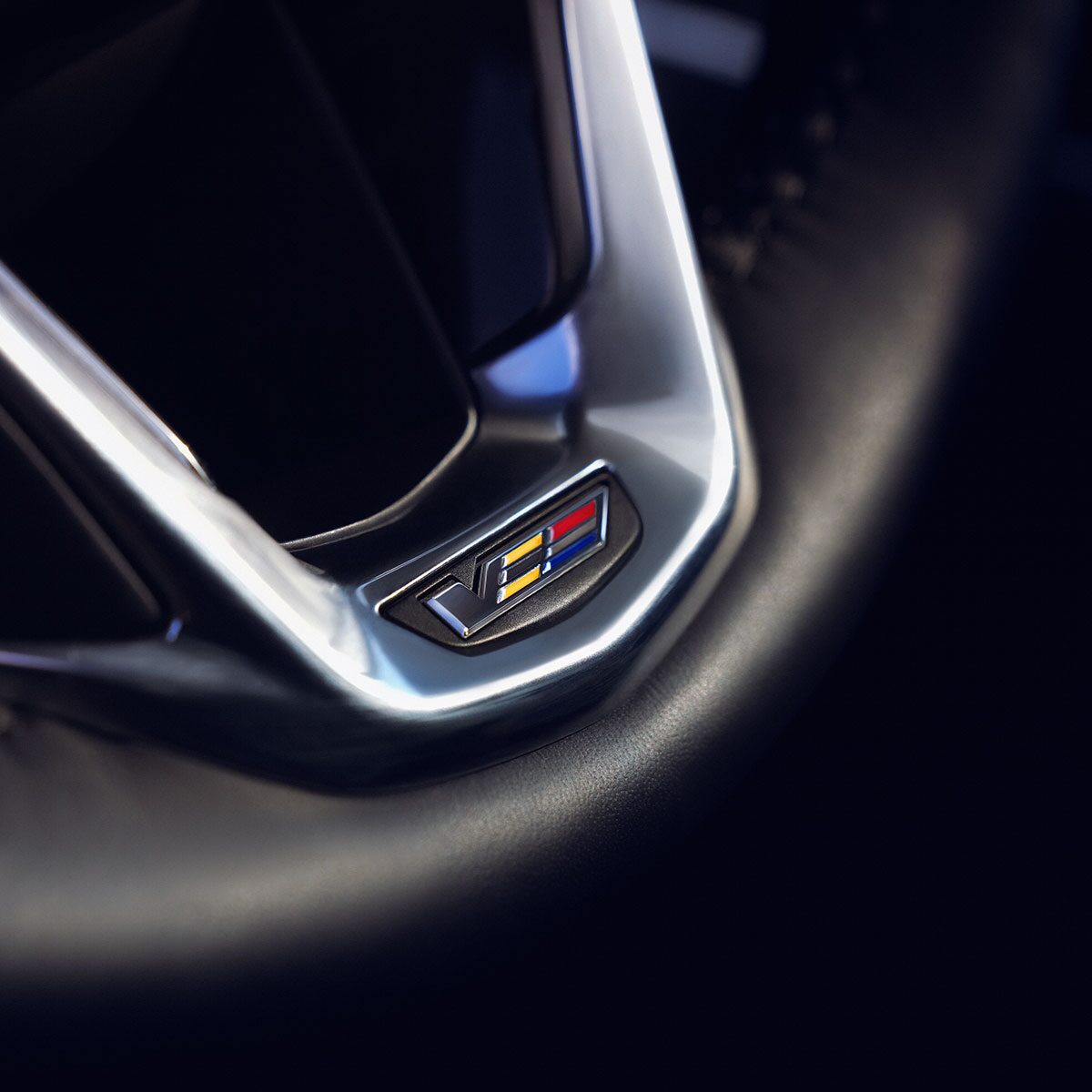2024 Escalade V-Series Badge on the steering wheel.