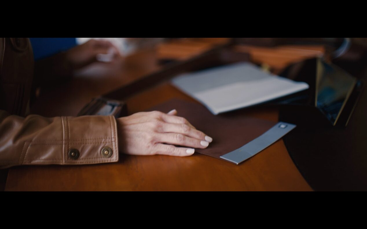 Hand Resting On Table Touching Samples