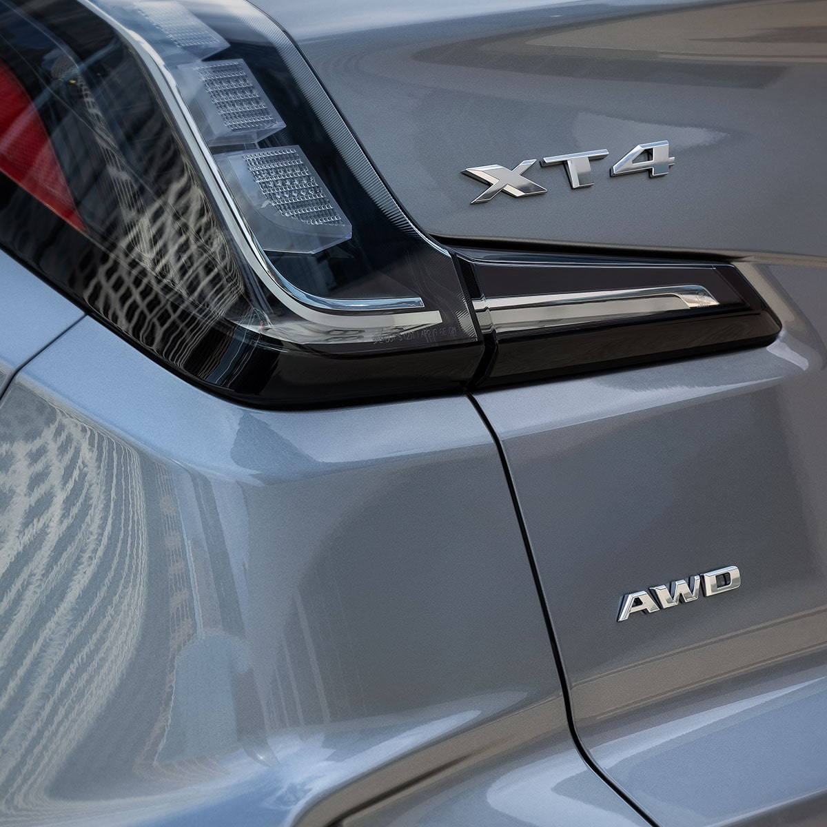 Close-up of the 2025 Cadillac XT4 Rear Tail Lights and Nameplate on Trunk