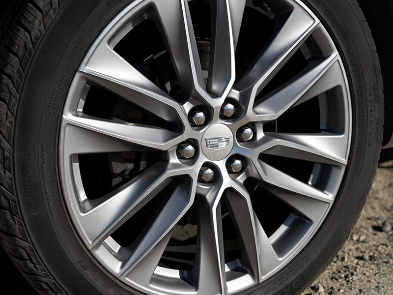 Driver's Side View of 2025 Cadillac XT6's Impressive Wheels and Red Calipers