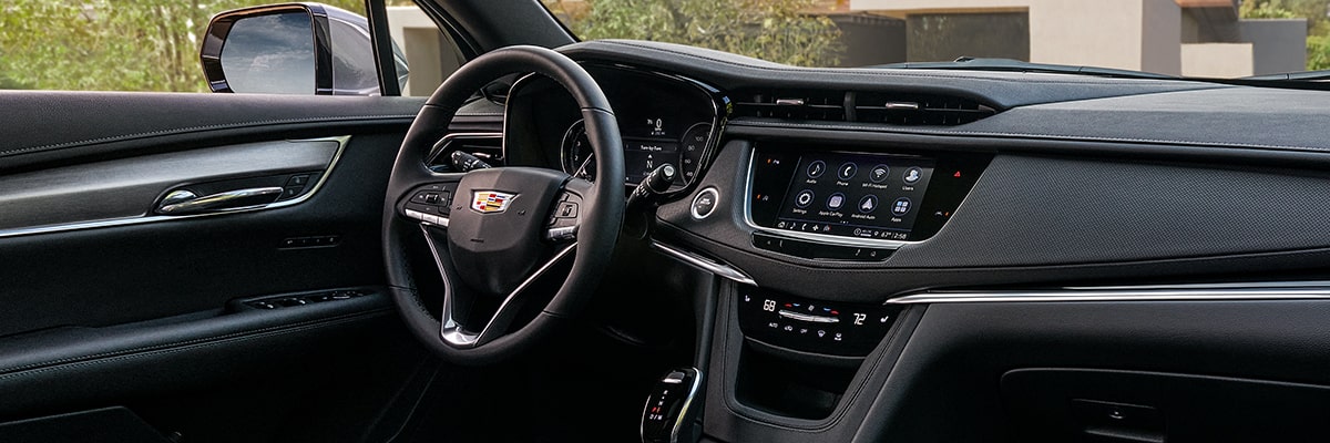 Front Passenger Seat View of the Control Switches and the Steering Wheel of the Cadillac XT6