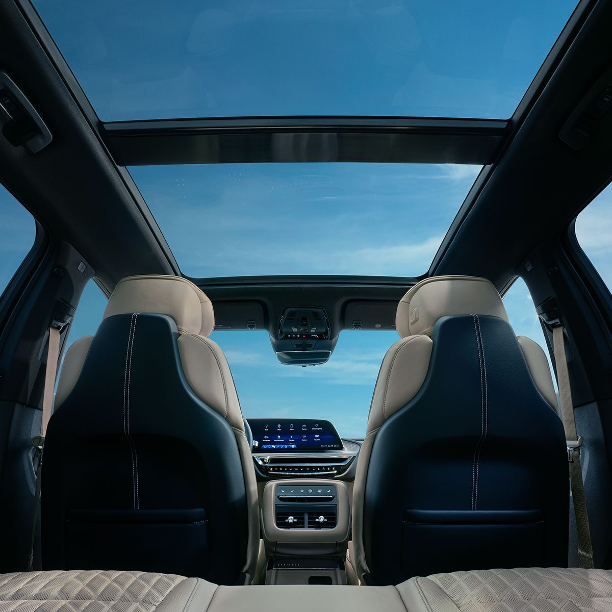 Back Seat View of the 2025 Cadillac LYRIQ Front Row and Panoramic Sunroof
