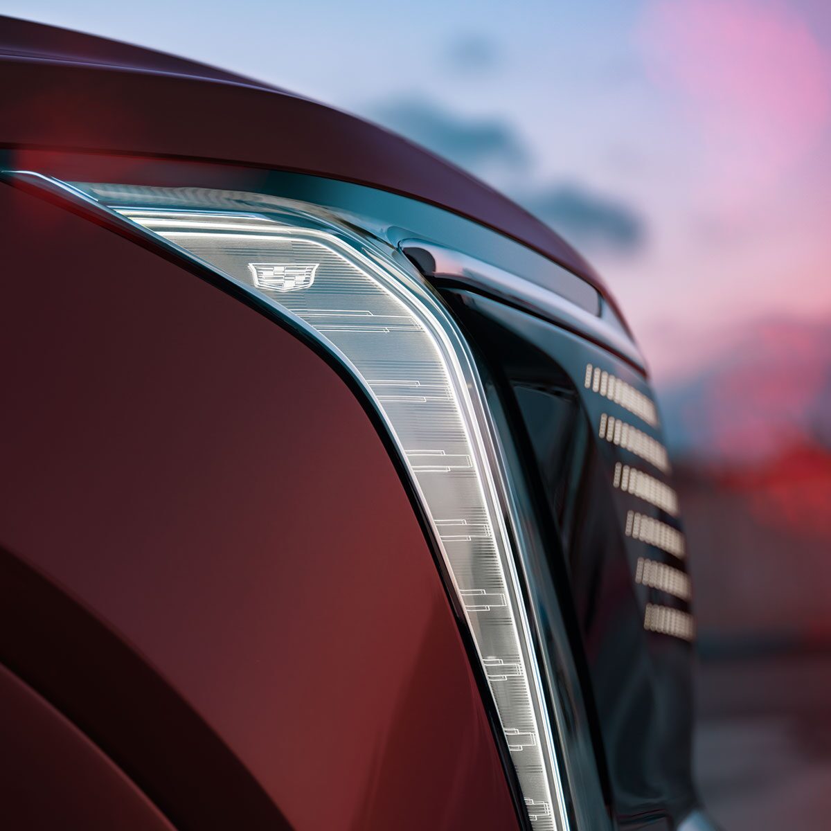 2025 Cadillac Escalade IQ Parked Outside a Restaurant at Night