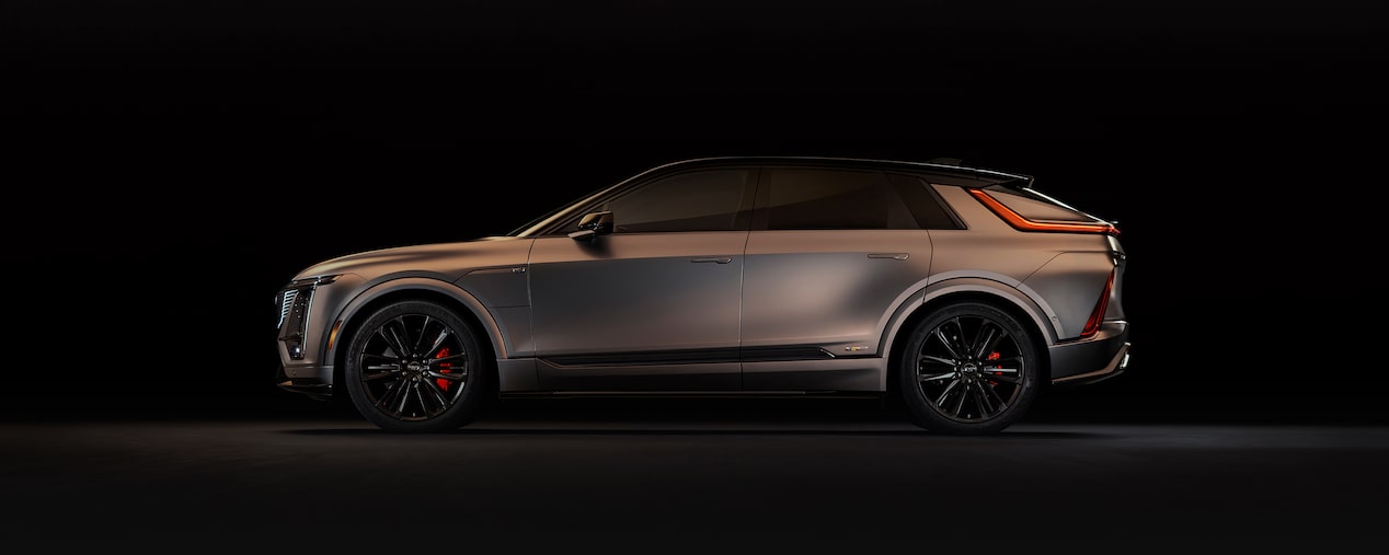 A Side Profile of the 2026 LYRIQ-V Parked in a Black Showroom