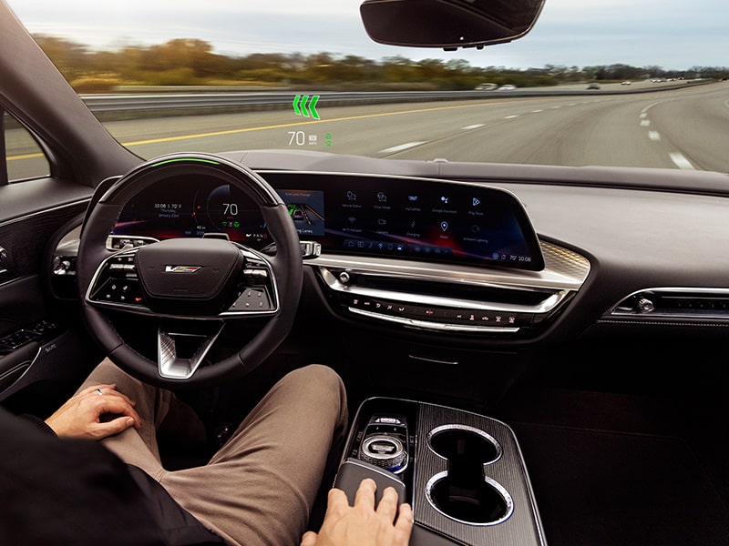 Top View of a Driver Utilizing the Super Cruise Feature in a 2026 LYRIQ-V While Driving