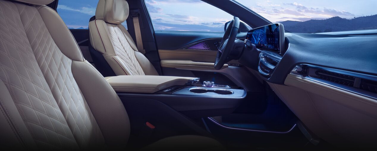 Passenger Seat View of the Cadillac LYRIQ Front Row Cabin Outlooking the Mountains