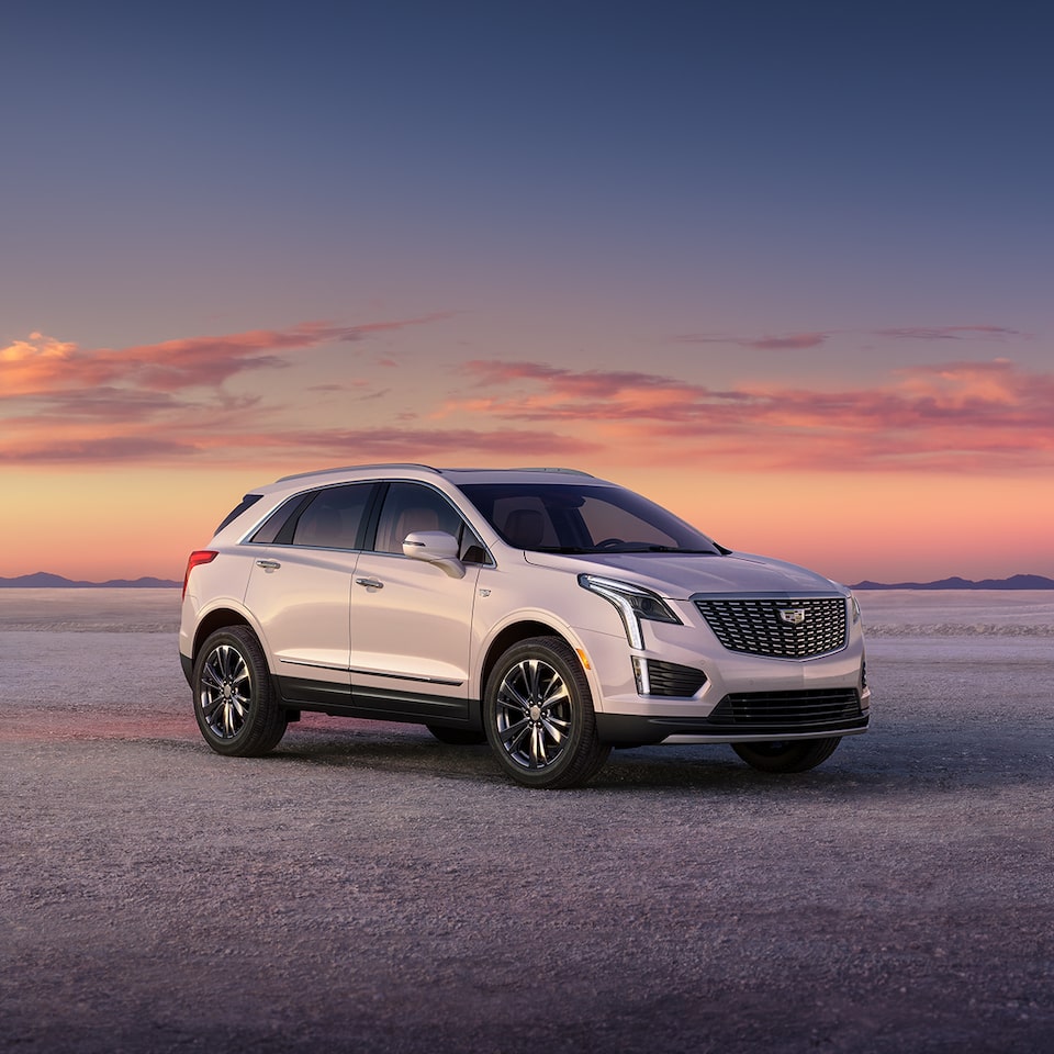 The Crystal White Tricoat Cadillac XT5 Parked During a Lovely Sunset in Desert