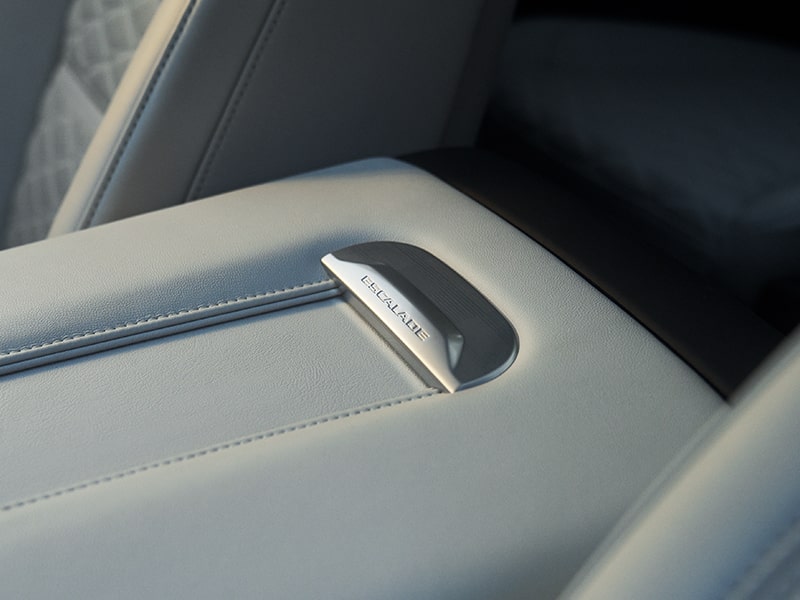Close-Up of the Escalade Nameplate on the 2025 Escalade's Middle Console
