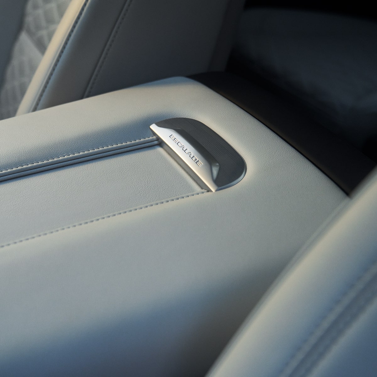 Close-Up of the Escalade Nameplate on the 2025 Escalade's Middle Console