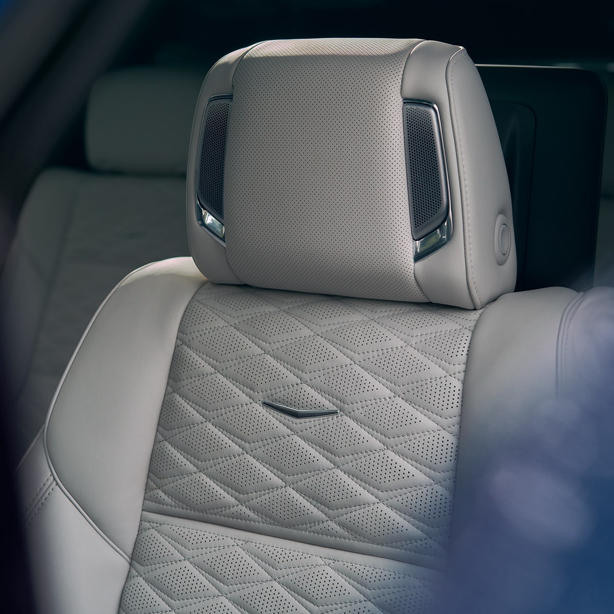 Close-Up of the Speakers in a Seat Headrest of the 2025 Cadillac Escalade