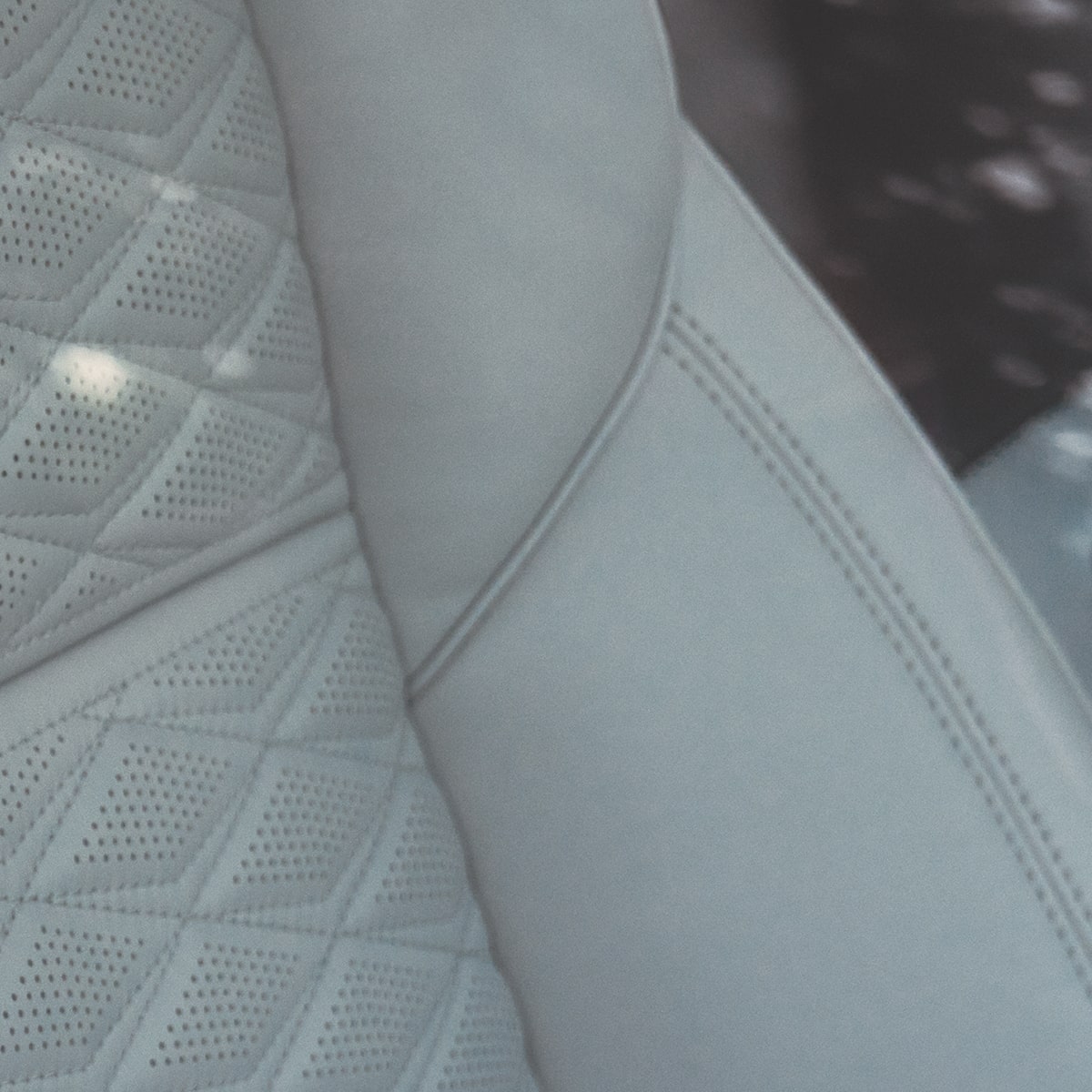Close-Up of the 2025 Escalade Sheer Grey Full Semi-Aniline Leather Seats with Faceted Quilting