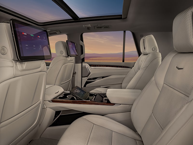 The Executive Second Row of the 2025 Escalade Outlooking a Beautiful Sunset