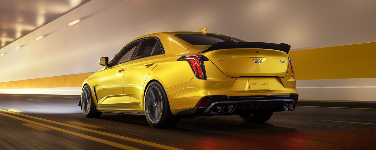 A Yellow CT4-V Blackwing Driving through a Tunnel with It's Headlights On