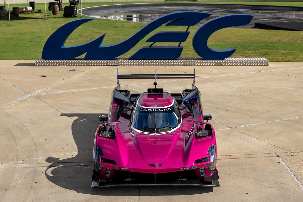 Front View of the Pink Cadillac V-Series.R Racecar Parked on a Race Track