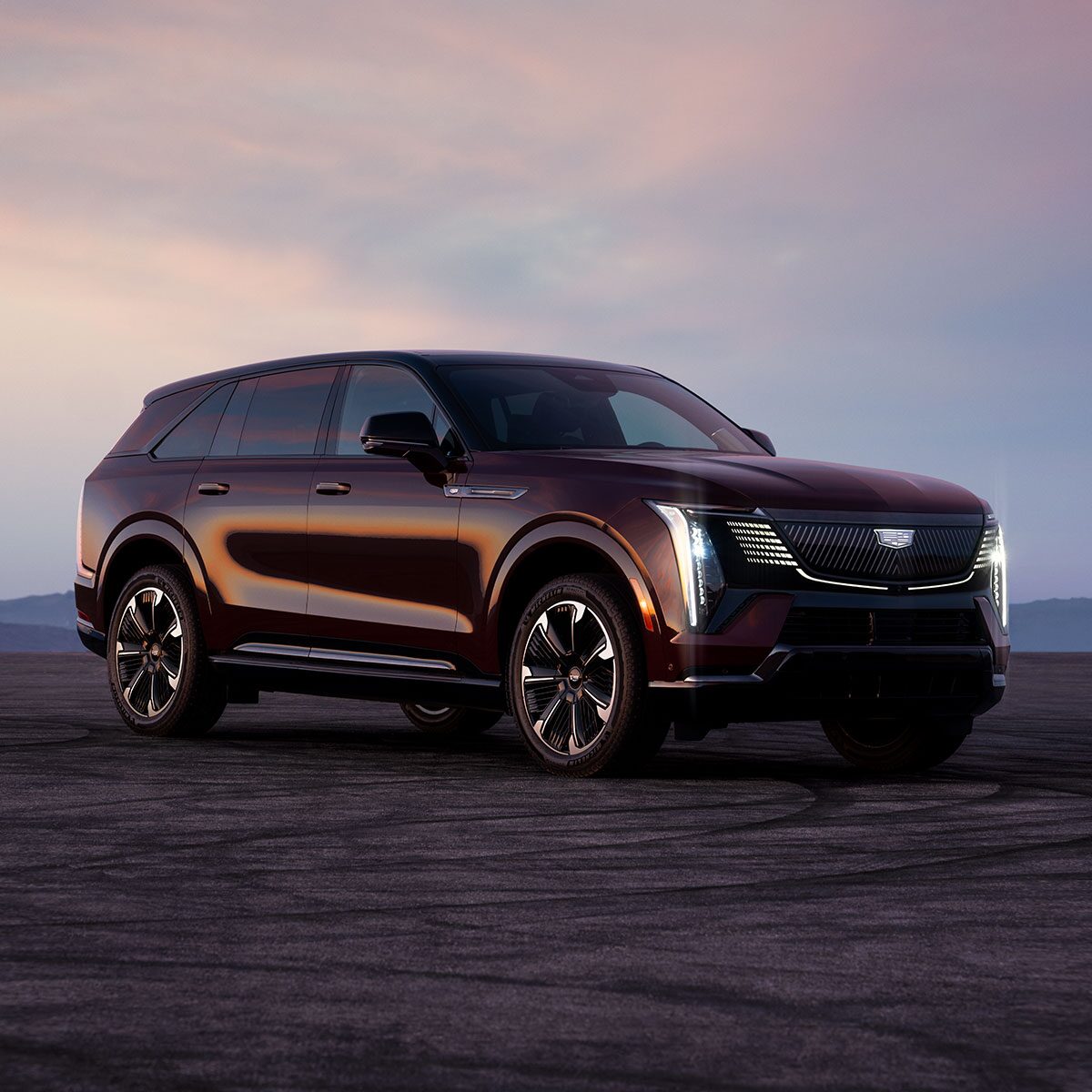 2025 Cadillac Escalade IQ Parked In Front of a Garage