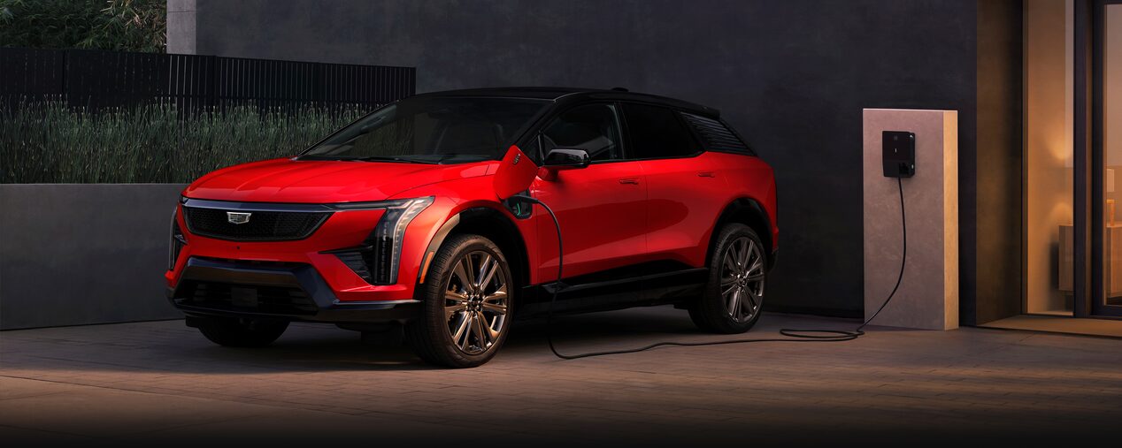 A Cadillac LYRIQ Charging in a Garage at Home